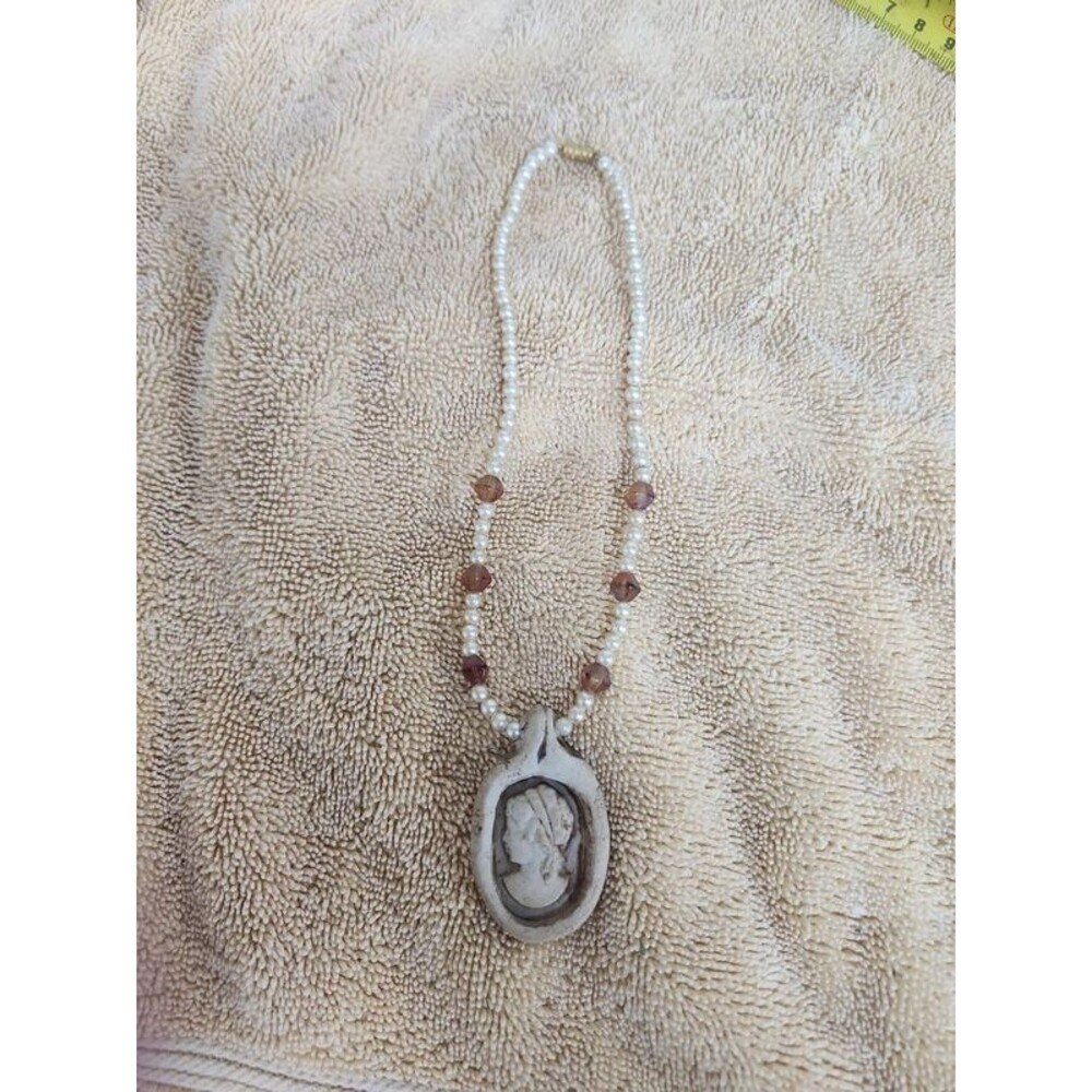 Antique cameo made from clay beaded necklace